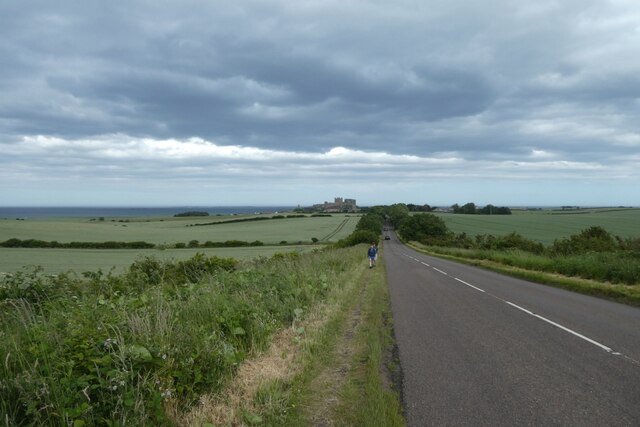 The B1342 winding through Northumberland towards Bamburgh Castle